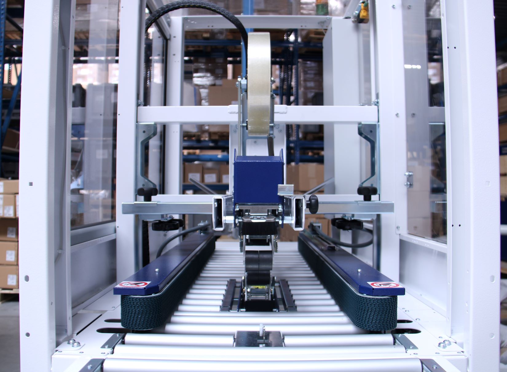 Carton taping machine